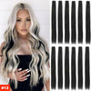A model displays long, wavy platinum blonde hair extensions with dark highlights and straight black hair extensions.