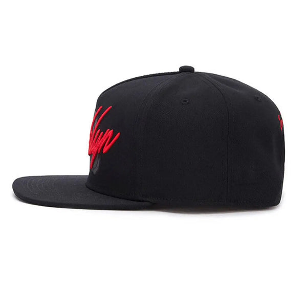 Black unisex adjustable snapback cap with red embroidered text