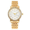 A gold-toned quartz wristwatch with a white face, crystal bezel, and gold links on a white background.
