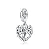 A silver pendant featuring a detailed family tree design and an oval bail.