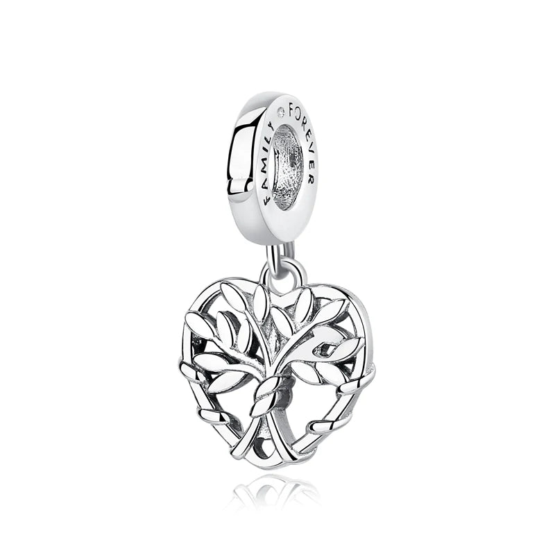 A silver pendant featuring a detailed family tree design and an oval bail.