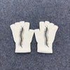 Pair of off-white fingerless knit gloves with a brown printed snake design on the back