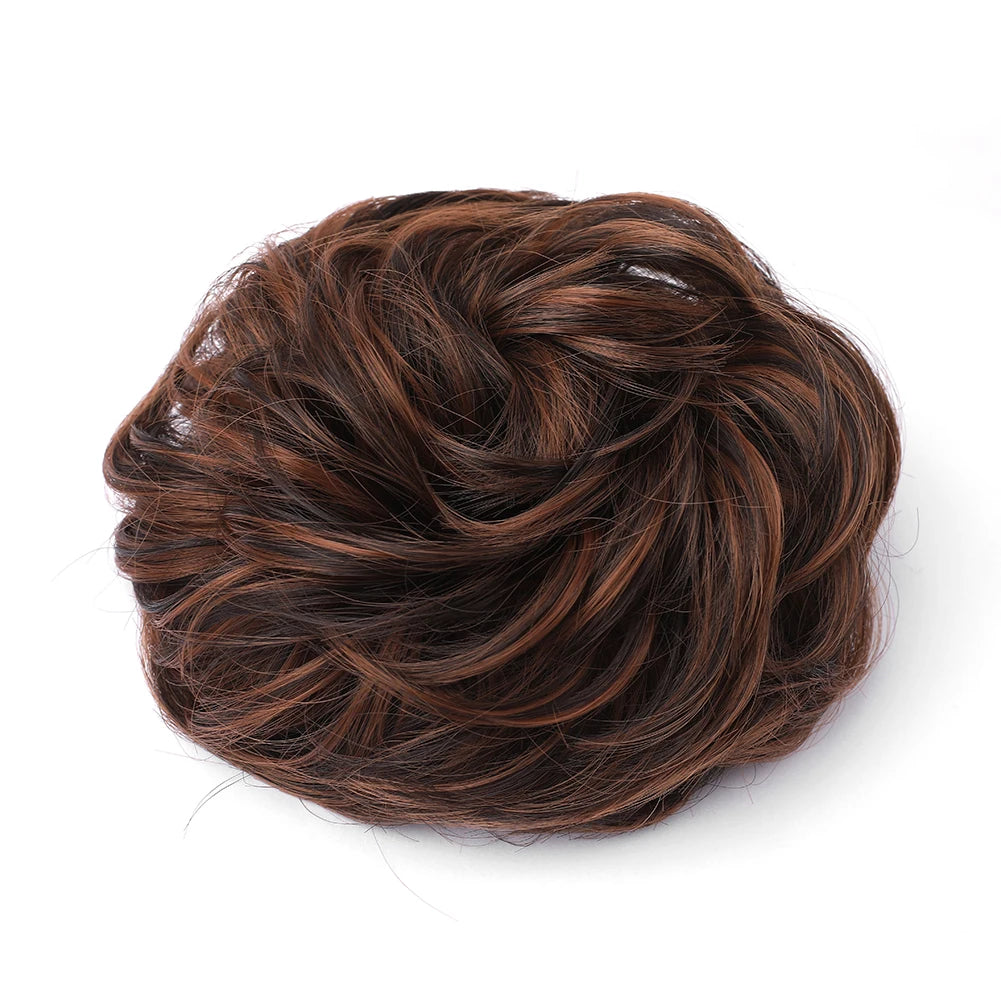 A dark brown, messy bun hairstyle for curly updos.