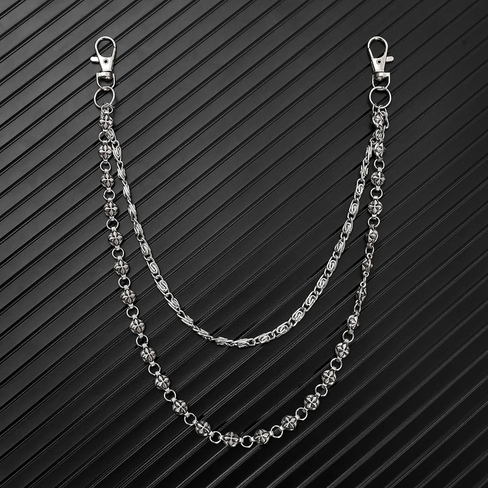 A silver double-layer waist chain accessory displayed against a dark, striped background.