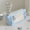 A light blue lace pencil case is shown open on a white surface with pencils and decorative stars nearby.