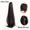 Schwarze braune glatte Haarextensions mit einer Krausenpinzelle und Detailaufnahme.