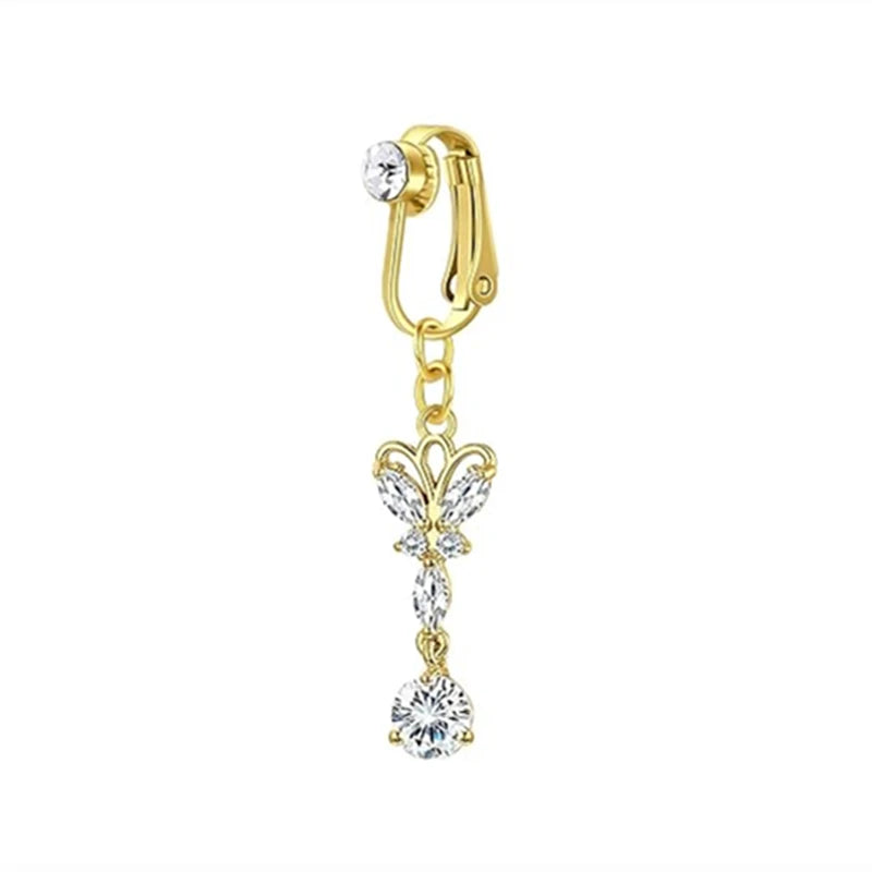 Gold fashion belly button rings featuring a delicate chain and a sparkling diamond-cut pendant.