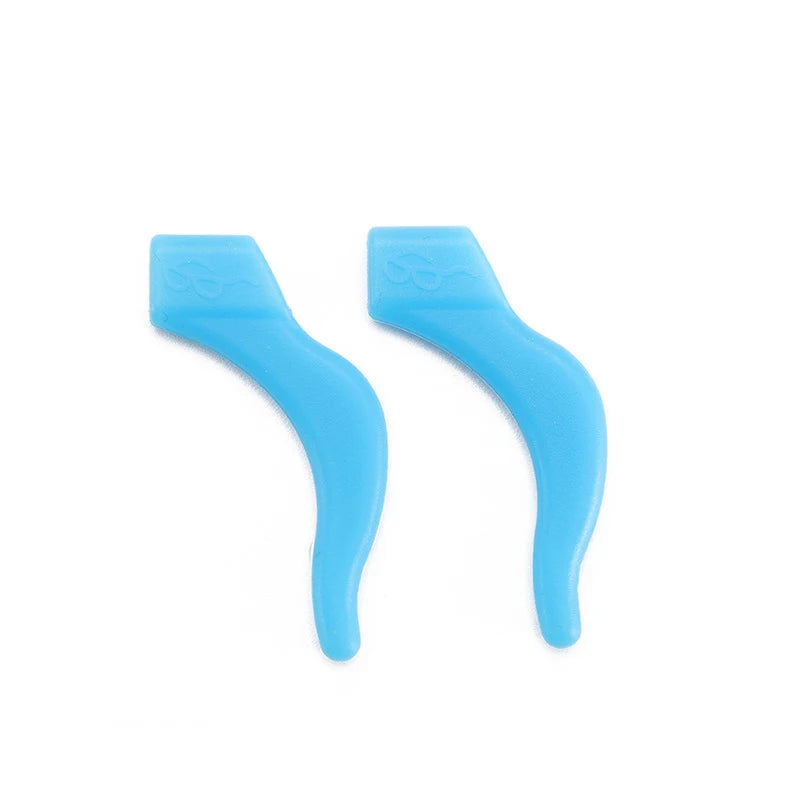 A pair of light blue silicone ear hooks designed for eyeglasses or sports use.