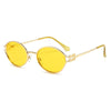 Gelige retro ovale Sonnenbrille mit dünnen goldenen Metallrahmen