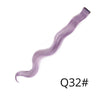 A long, purple synthetic hair extension is shown lying diagonally against a white background.