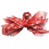 Lazo de tela roja y blanca estampada usado como elegante clip para el cabello vintage