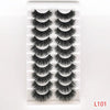 A set of dramatic mink false eyelashes displayed in a clear packaging.