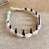 Brown resin wave toothed headband for women made of fuzzy yarn