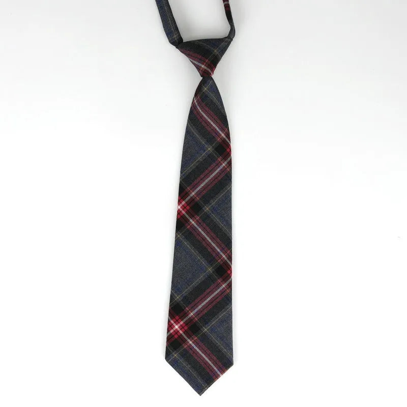 A dark blue and red plaid necktie with a diagonal stripe pattern.