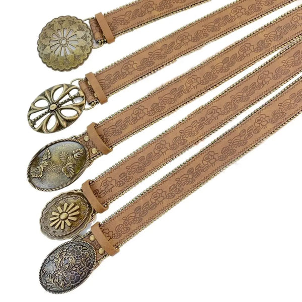A set of vintage PU leather boho western belts with decorative metal buckles and patterned leather straps.