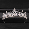 Silver crystal rhinestone bridal tiara headpiece with delicate floral and pearl accents