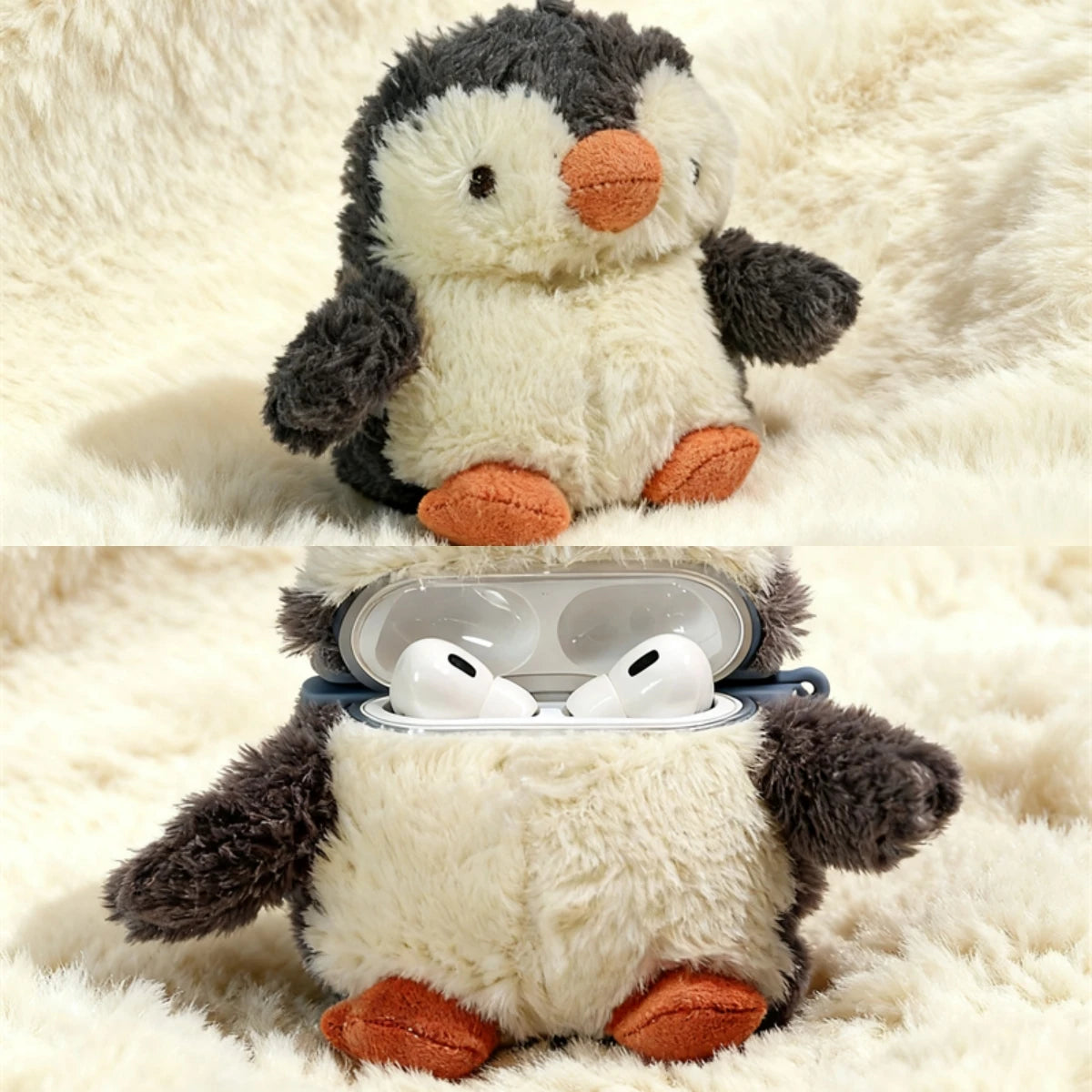 Un pingüino de peluche con pelaje gris y blanco, sentado sobre una superficie crema, protegiendo unos auriculares blancos den