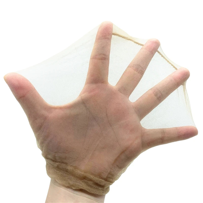 A hand wearing an ultra thin invisible wig cap for natural hair, showing the sheer mesh material.