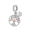 A silver family tree charm necklace featuring a detailed tree design and a round tag engraved with the word Family.