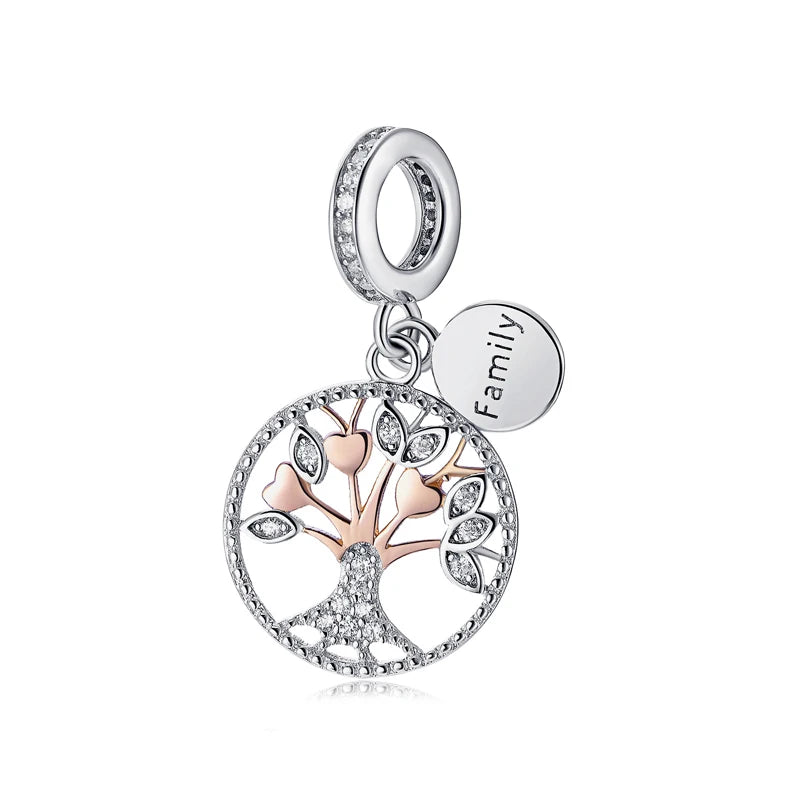 A silver family tree charm necklace featuring a detailed tree design and a round tag engraved with the word Family.