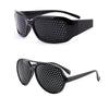 Black vision correction pinhole glasses with a dark lens and black frame