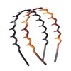 A set of orange zigzag headband hair combs for face concealment.