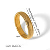 A close-up view of a gold-toned elastic bangle bracelet showing its inner diameter and weight.