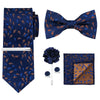 A navy blue patterned tie and bow tie set with a matching pocket square and bar tack.