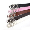 A collection of vintage gothic moon star buckle belts in various colors including black, pink, brown, and silver.