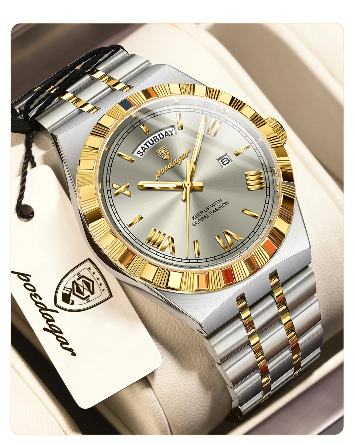 A silver and gold men's watch with a leather strap is shown on a light background.