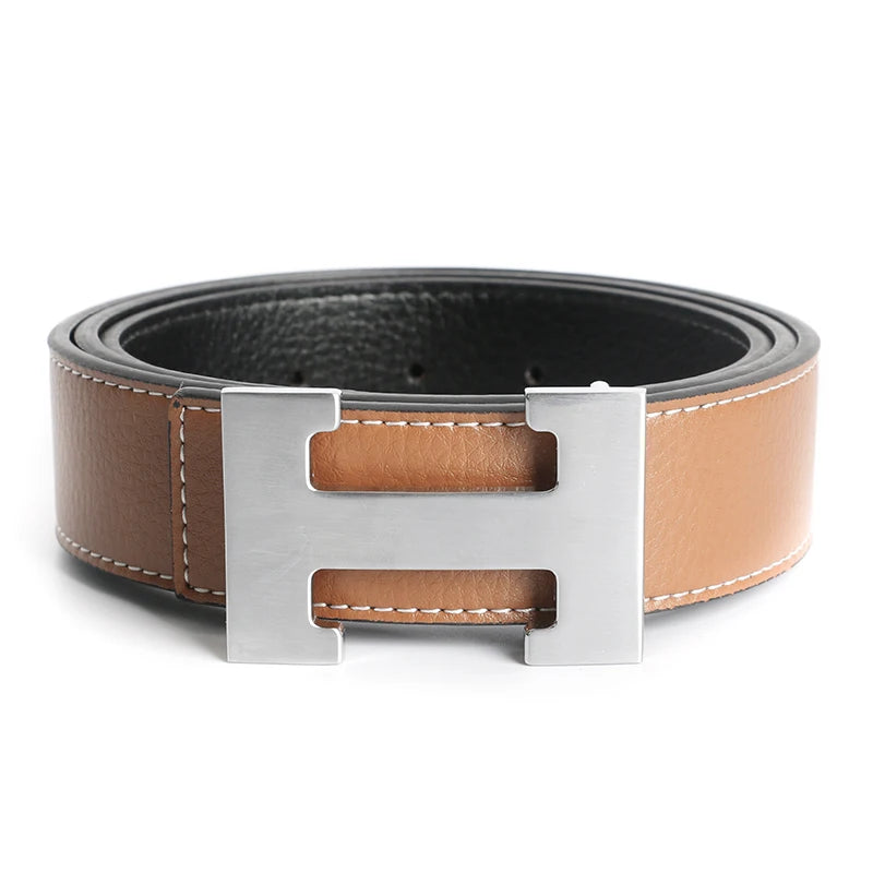 A brown genuine leather dress belt with a silver buckle shown flat.