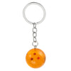 Silver split ring keychain with an orange spherical charm featuring red stars