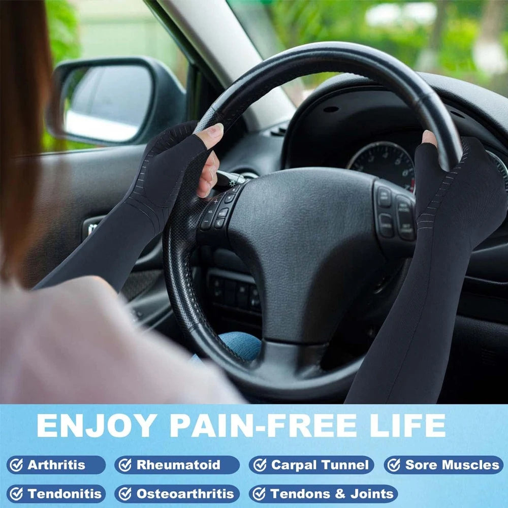 Black compression gloves being worn on a steering wheel, suggesting pain relief for arthritis and tendon issues.