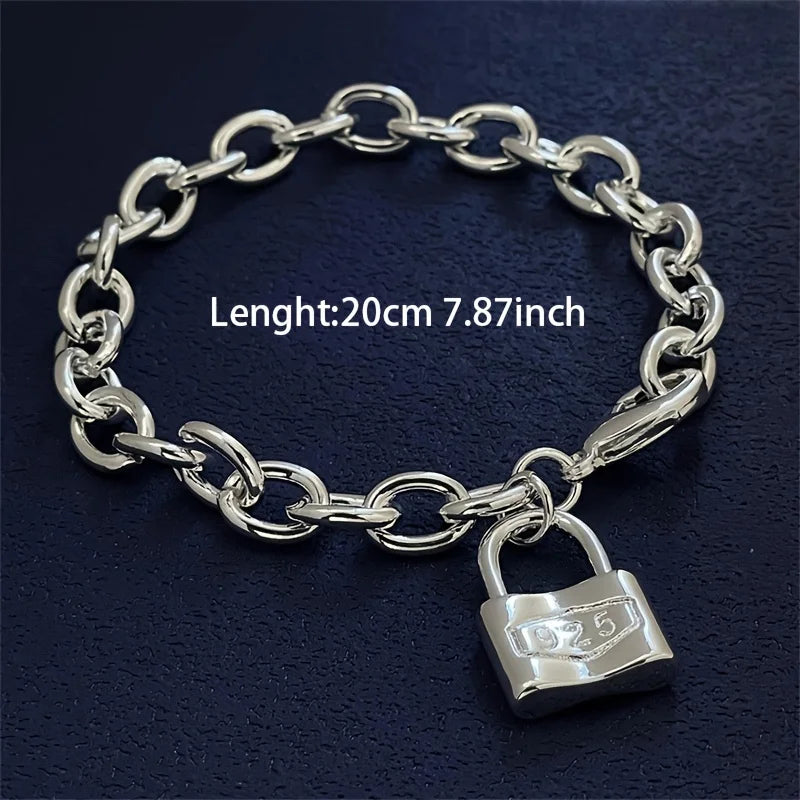 A silver charm lock bracelet made of 925 sterling silver chain with a padlock charm.
