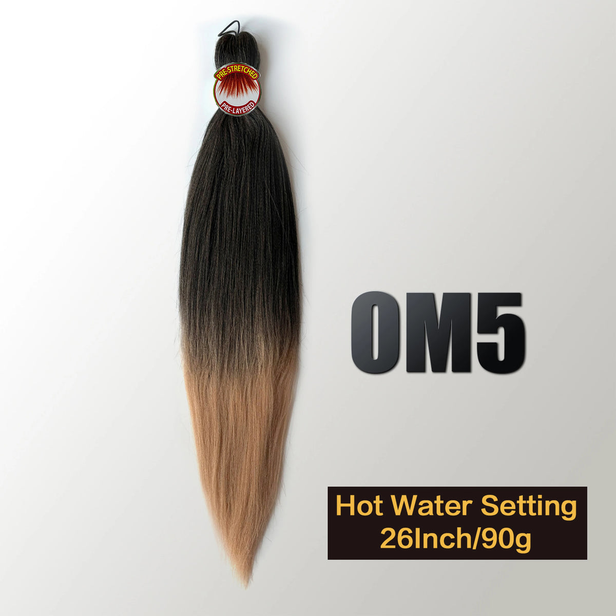 A bundle of dark and light ombre hair extensions with a decorative tag.