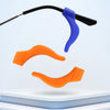 Silicone ear hooks in blue and orange are shown against a white background.