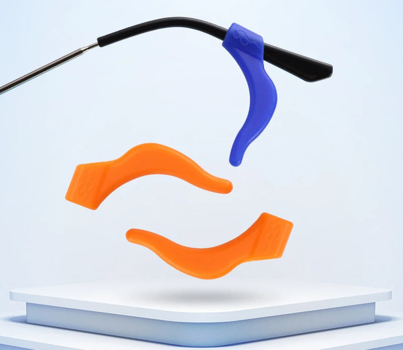 Silicone ear hooks in blue and orange are shown against a white background.