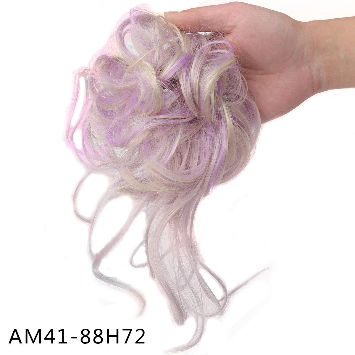 A hand holds a bundle of light purple and white synthetic hair, styled into a loose bun or ponytail.
