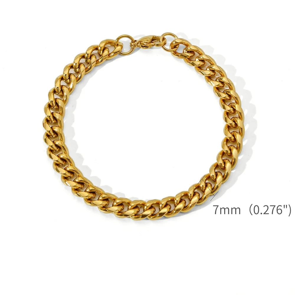 A gold-colored stainless steel Cuban link bracelet shown against a white background.