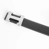 A black genuine leather dress belt with a silver buckle and stitching.