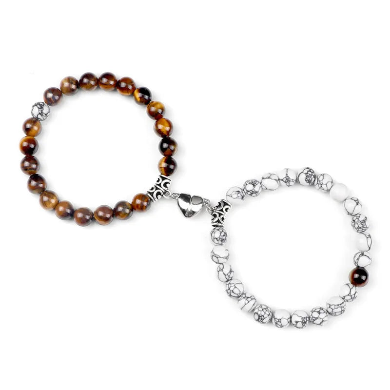 A pair of natural stone heart couple bracelets, featuring brown and white stones.