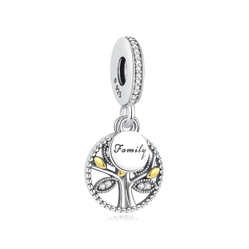 A silver charm featuring a family tree design with leaves and the word Family, suspended from a sterling silver pendant.