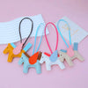 A set of elegant horse pendant charms in various pastel colors including yellow, blue, pink, and white.