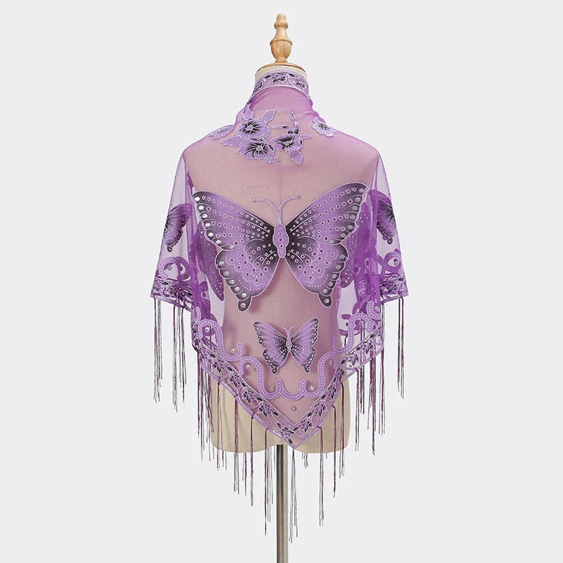 A sheer purple butterfly lace scarf shawl displayed on a mannequin.