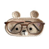 Handmade crochet bear ears and face forming an eyeglass storage case