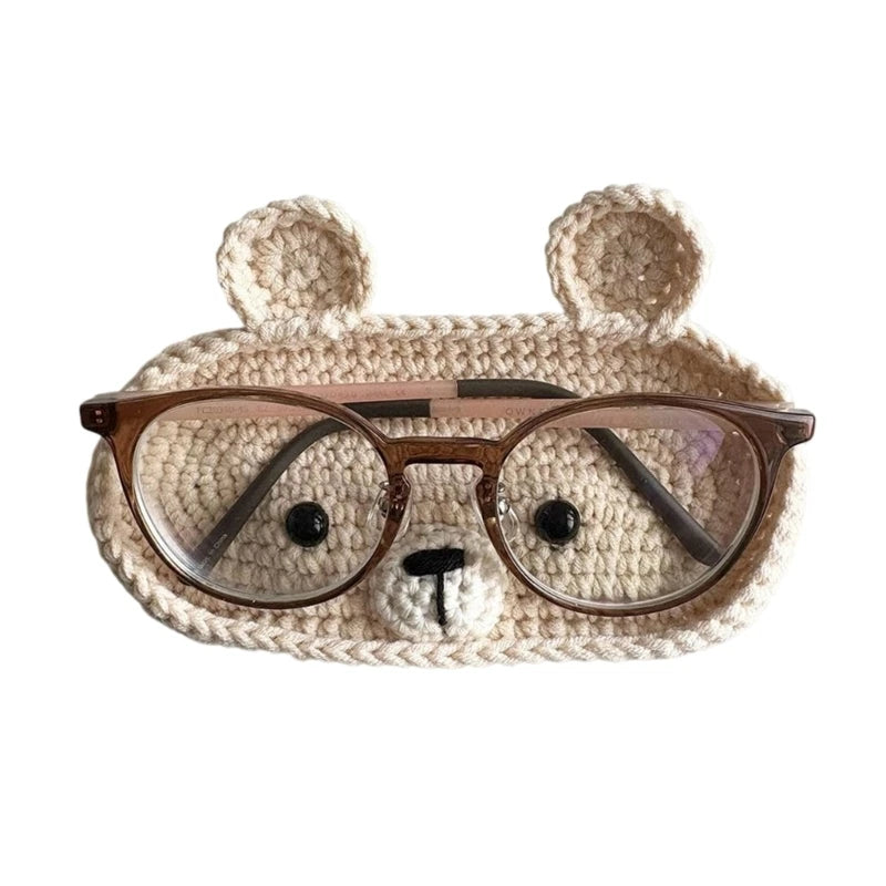 Handmade crochet bear ears and face forming an eyeglass storage case