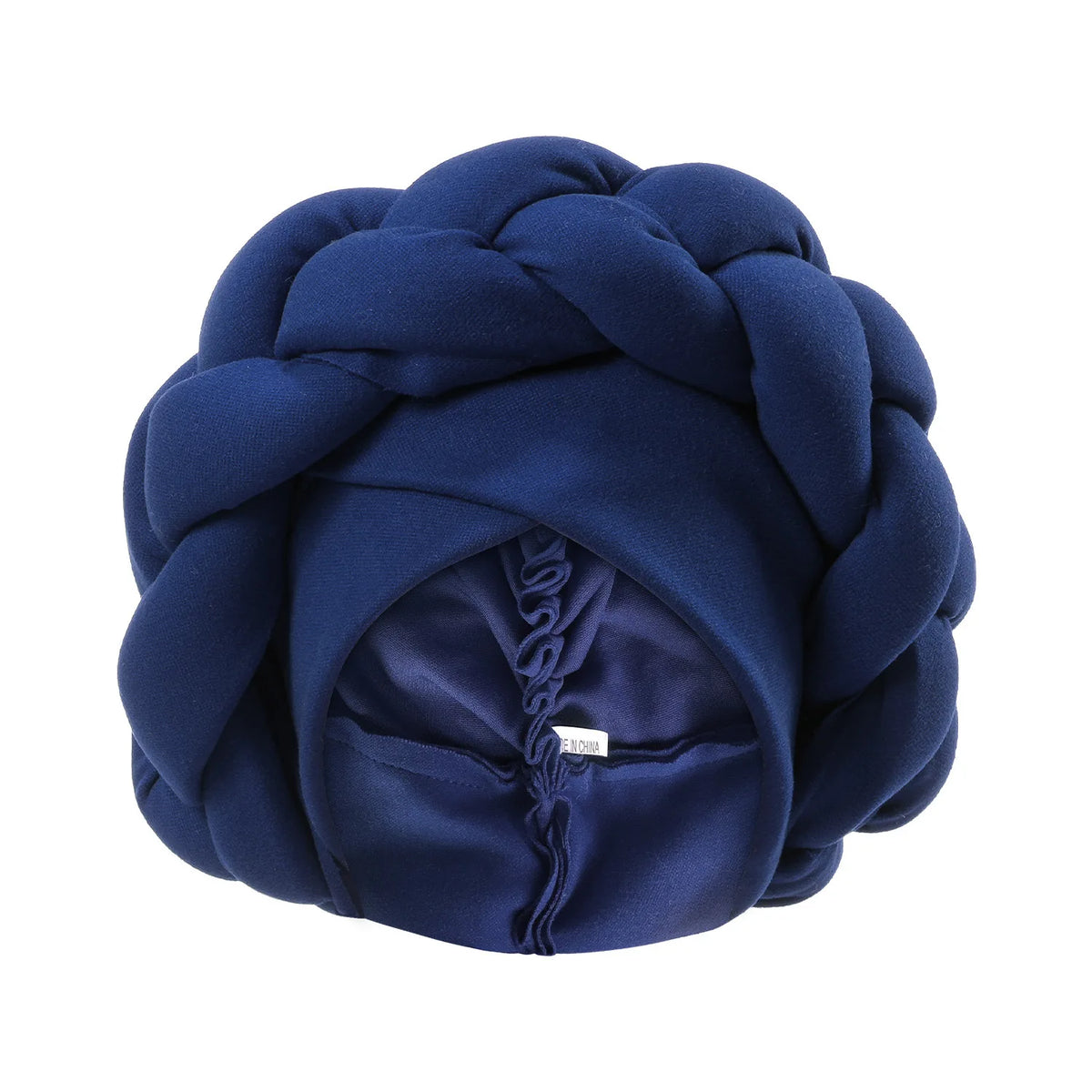 A navy blue braided turban cap for African party headwear