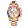 A rose gold men's quartz watch featuring pink and blue gemstone accents on the dial and diamond-set bezel.