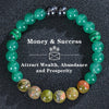 A bracelet made of various green and silver beads, including tiger eye crystals, for attracting wealth and prosperity.