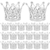 A collection of gold and silver mini crown cake toppers for parties.